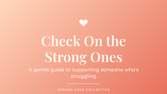 Warm peach-to-coral graphic reading "Check On the Strong Ones" with a heart, from Spread Love Collective's post on supporting someone who's struggling.